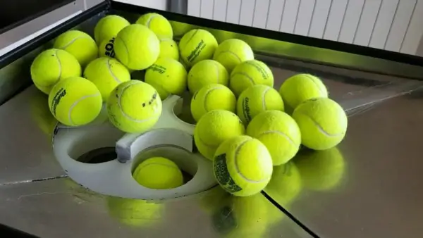 Cómo construir una máquina de pelotas de tenis